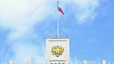 The flag of Russia and The coat of arms of Russia on the top of The House of the Government of the Russian Federation. UHD - 4K
