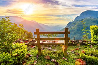 A bench with a view of the beautiful mountain valley at dawn. Ella, Sri Lanka