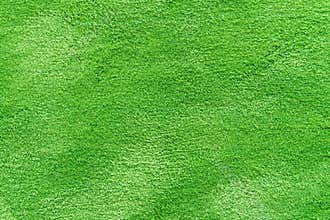 Natural grass texture patterned background in golf course turf from top view.