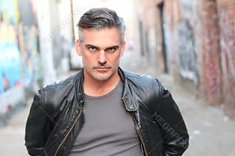 A tough man with salt and pepper hair