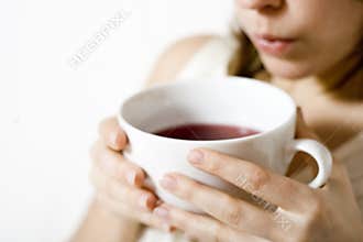 Woman holding tea