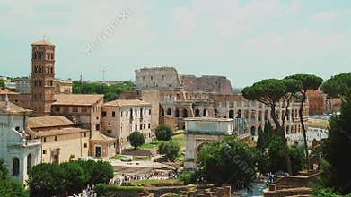 Ancient Roman Forum and the famous Coliseum in the background. Rome, Italy