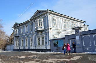 Irkutsk, Russia, March, 16, 2017. Tourists come from Irkutsk regional historical and memorial Decembrists ` Museum. The house-Muse