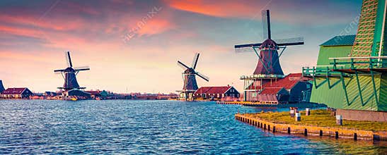 Panorama of authentic Zaandam mills on the water channel