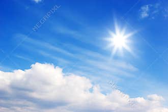 Bright sun and clouds