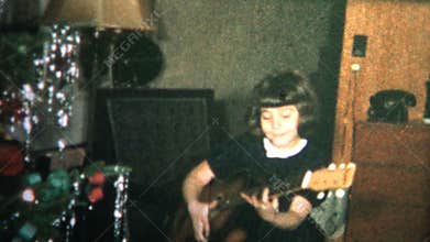(8mm Vintage) 1965 Siblings Making Music Christmas Morning