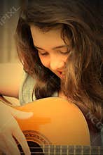 woman playing guitar