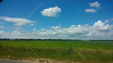 From the car passenger side POV view picturesque landscape