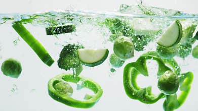 Brussels sprouts falling into water