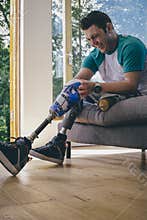 Amputee Attaching his Legs