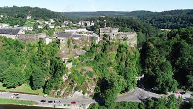 Aerial view of Bouillon medieval Castle in the town of Bouillon in the province of Luxembourg, Belgium, Europe in 4K.