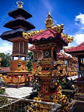 Gold Color Ethnic Balinese Shrines In The Middle Of The Temple At Patemon Village