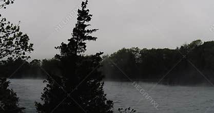 Fog rolling in on a blustery wind on a cold grey stormy day