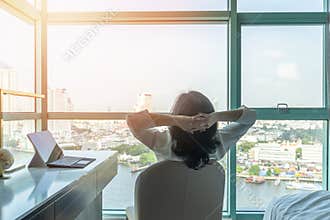 Work-life balance relaxation with Asian working business woman healthy lifestyle take it easy resting in comfort hotel or home