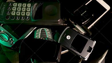 Old Vintage Cellular Mobile Phones From 1990s and 2000s. Spinning Close Up