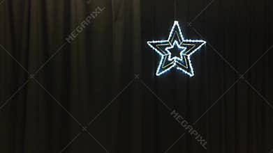 One flashing stars on stage curtain