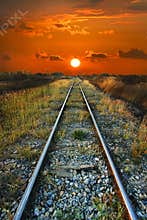 Sunrise on train way.