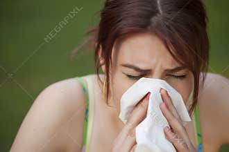 Sneezing woman