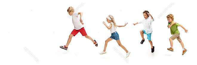 Happy little caucasian kids jumping and running isolated on white background
