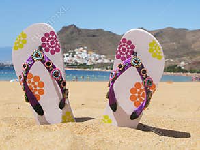 Flip-flops in the sand