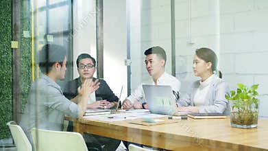 Team of asian business people meeting in company