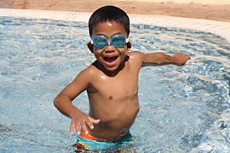 Young boy at a pool