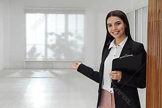 Female real estate agent showing apartment