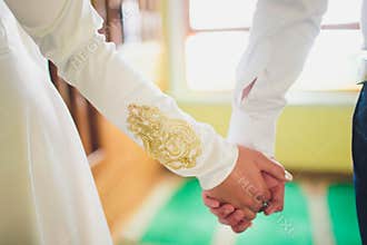National wedding. Bride and groom. Wedding muslim couple during the marriage ceremony. Muslim marriage.