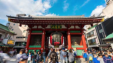 4K UHD time lapse of Asakusa sensoji gate, tourist crowd and blue sky in morning. Tokyo tourist attraction, Japan tourism, or Asia