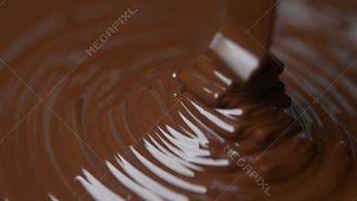 Melted dark chocolate flow