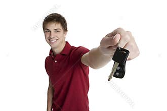 Attractive teenage boy holding car keys