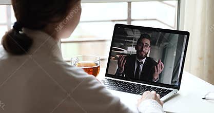 Arabic businessman online coach video calling client on laptop screen