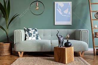 Stylish, Scandinavian living room with mint sofa.