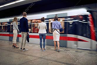 Group of commuters waiting for a subway