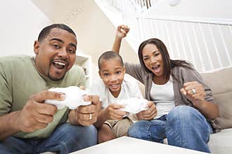 Fun African American Family Playing Video Games