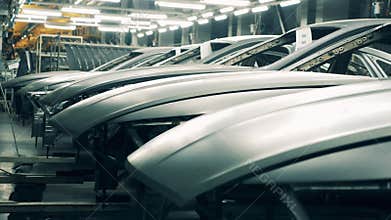 Car bodies at a car manufacturing plant.