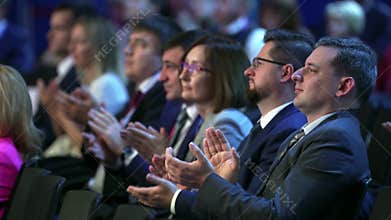 Applause crowded audience business people. Forum group man clap speech speaker.