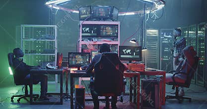 Young hackers talking in basement