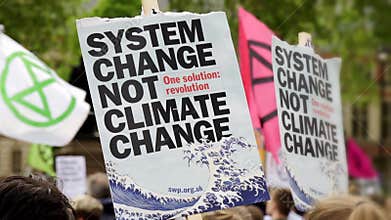 Flags and banners Waving During Extinction Rebellion Global Climate Change Rally In Parliament Square,Lo