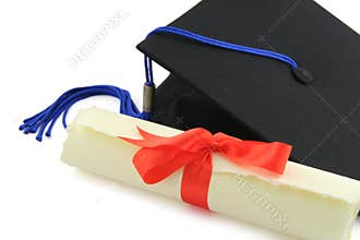 Diploma and graduation cap