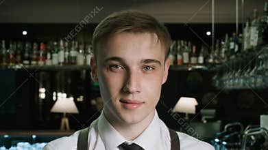 Portrait of Handsome Bartender Mixologist in Bar. Shot on Red Epic 4k Uhd Camera.
