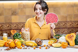 Human brain model and variety of healthy fresh food