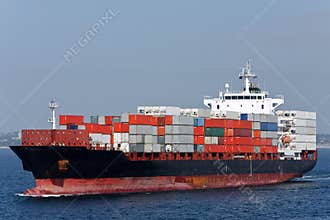 Container cargo ship at sea.
