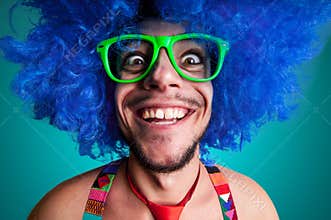 Funny guy naked with blue wig and red tie