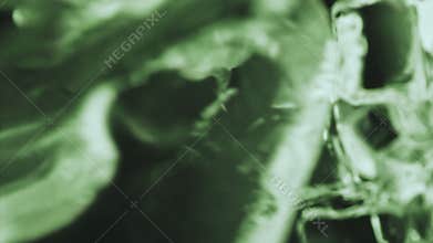 Ice cubes falling down in glass, macro extreme closeup.Pov view throw green ice cubes.Super slow motion 1000fps pour