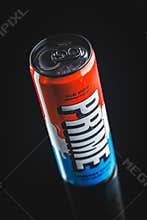 Prime Energy Drink . Bottle drink on black table
