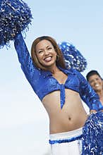 African American Woman Cheering With Pompom