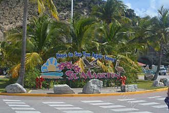 Farewell Sign at St. Maarten Port with Palm Trees and Decorations