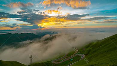 billowing clouds at sunset