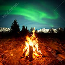 Camp Fire Watching Northern Lights
